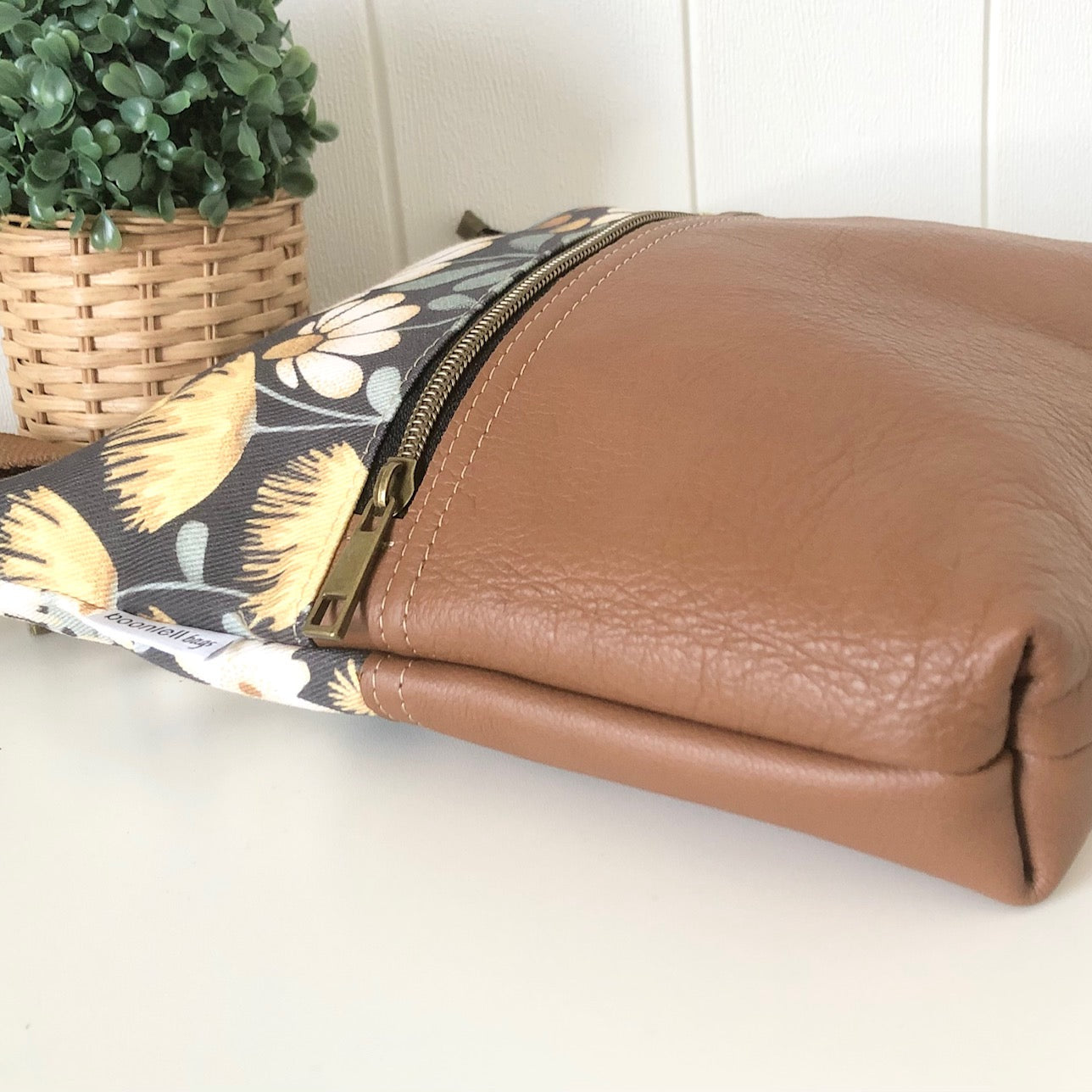 floral leather bag side view