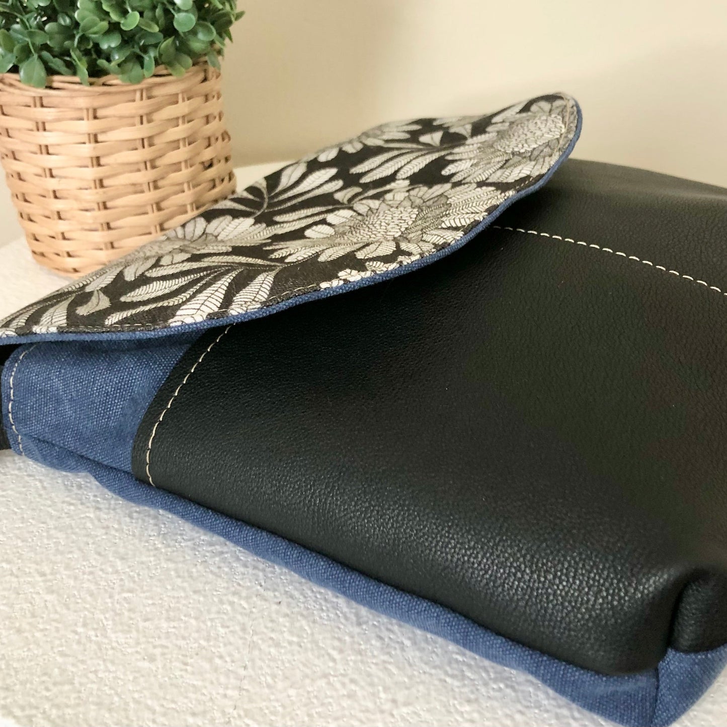 black and blue bag side view