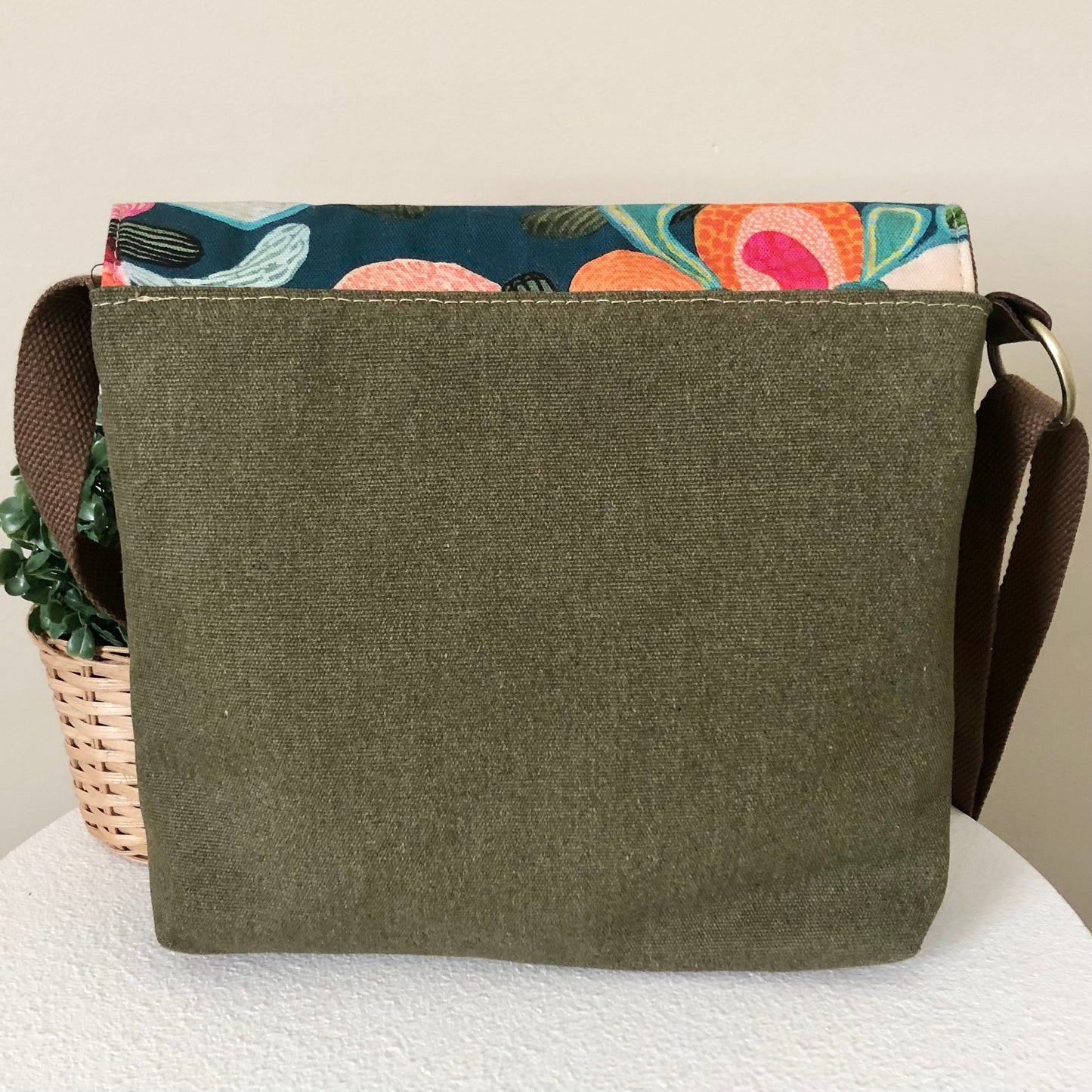 green canvas bag back view