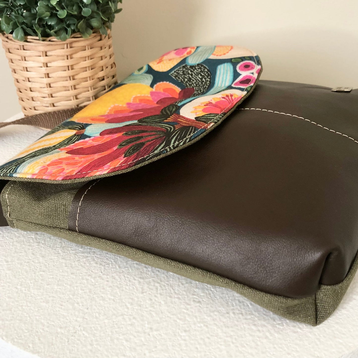 brown and green bag side view