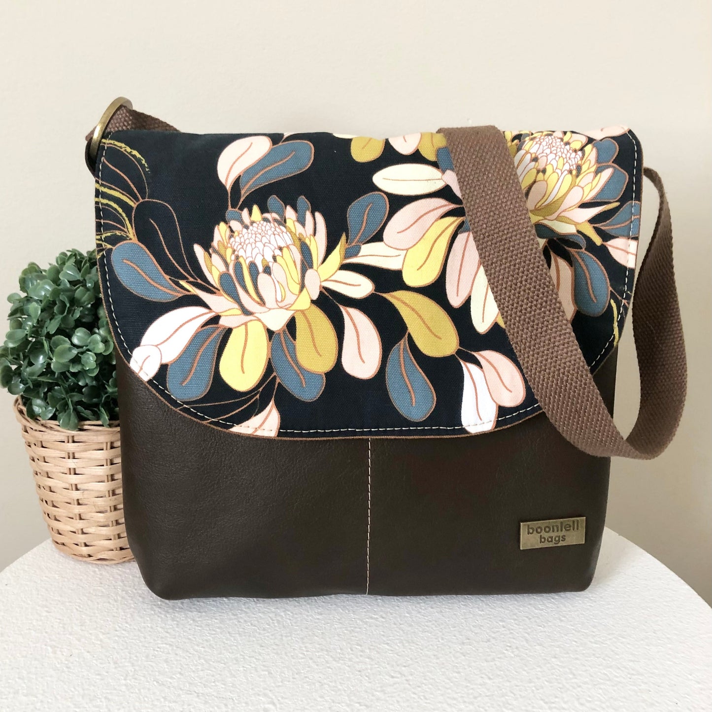 brown leather cross body bag front