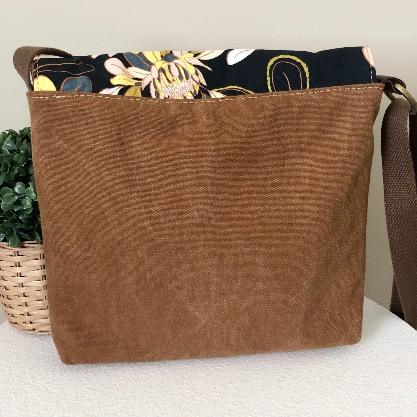 brown leather cross body bag back view
