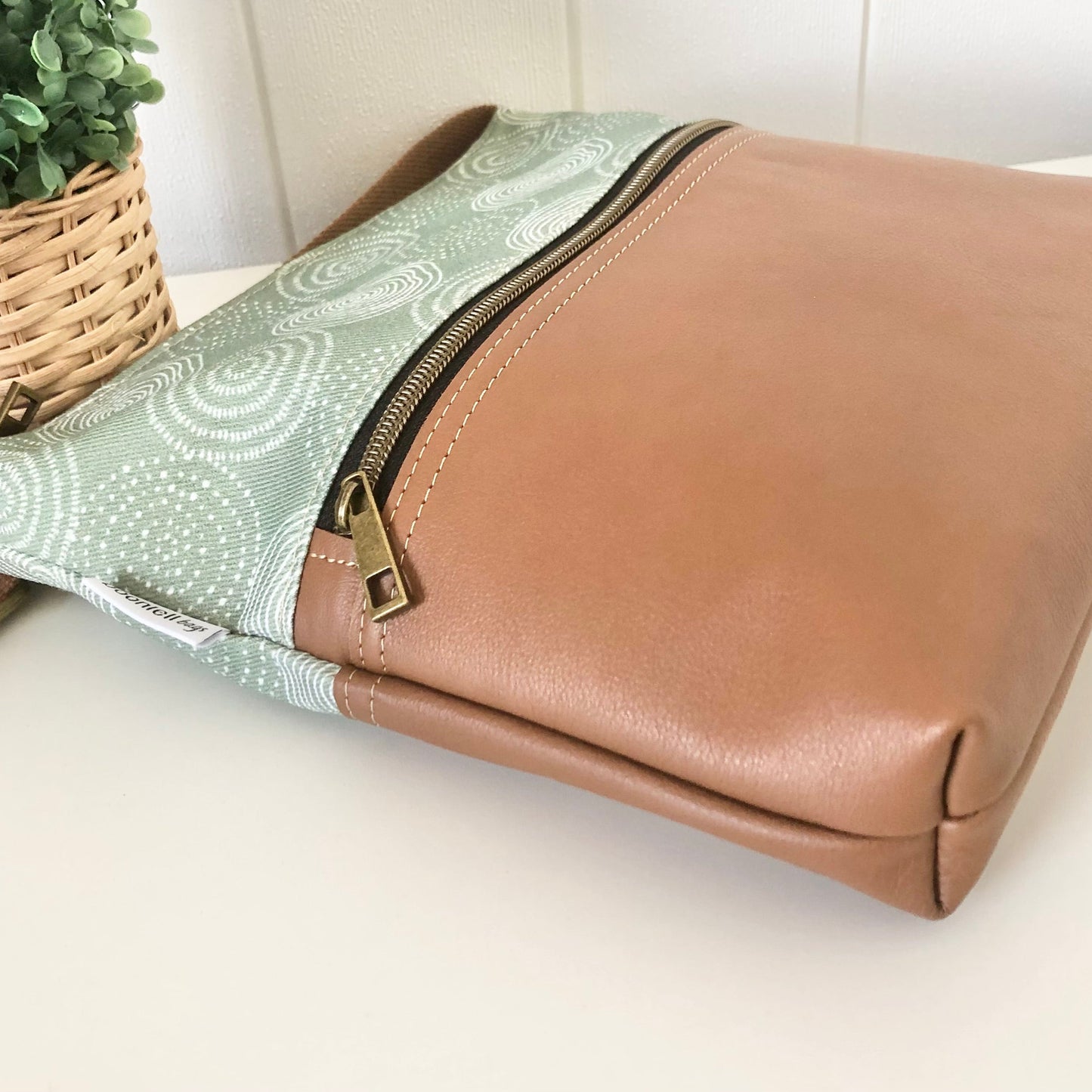 side view tree ring leather bag