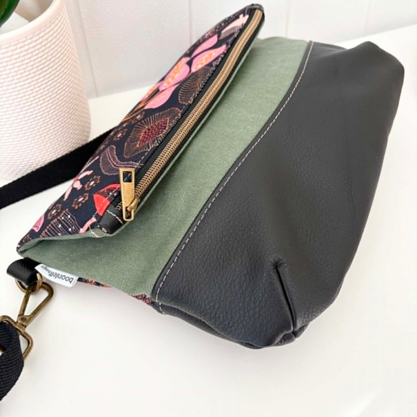 Hovea Fold Over Bag in Tan Leather, Green Canvas and Seed Pod