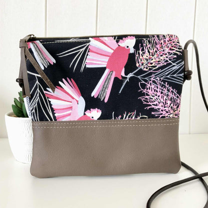 Crossbody bag with pink bird and floral pattern 