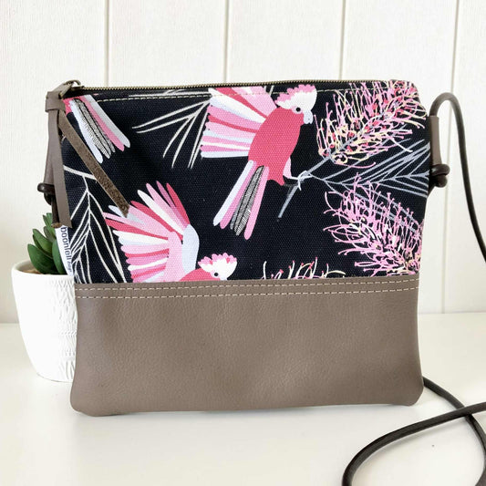 Crossbody bag with pink bird and floral pattern 