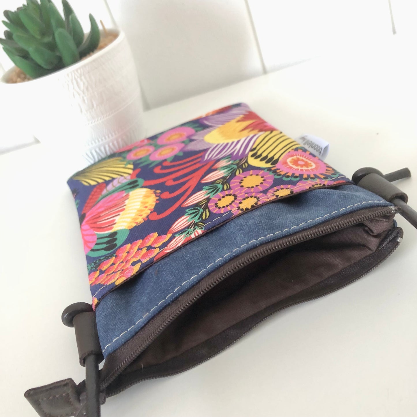blue canvas phone sling inside photo