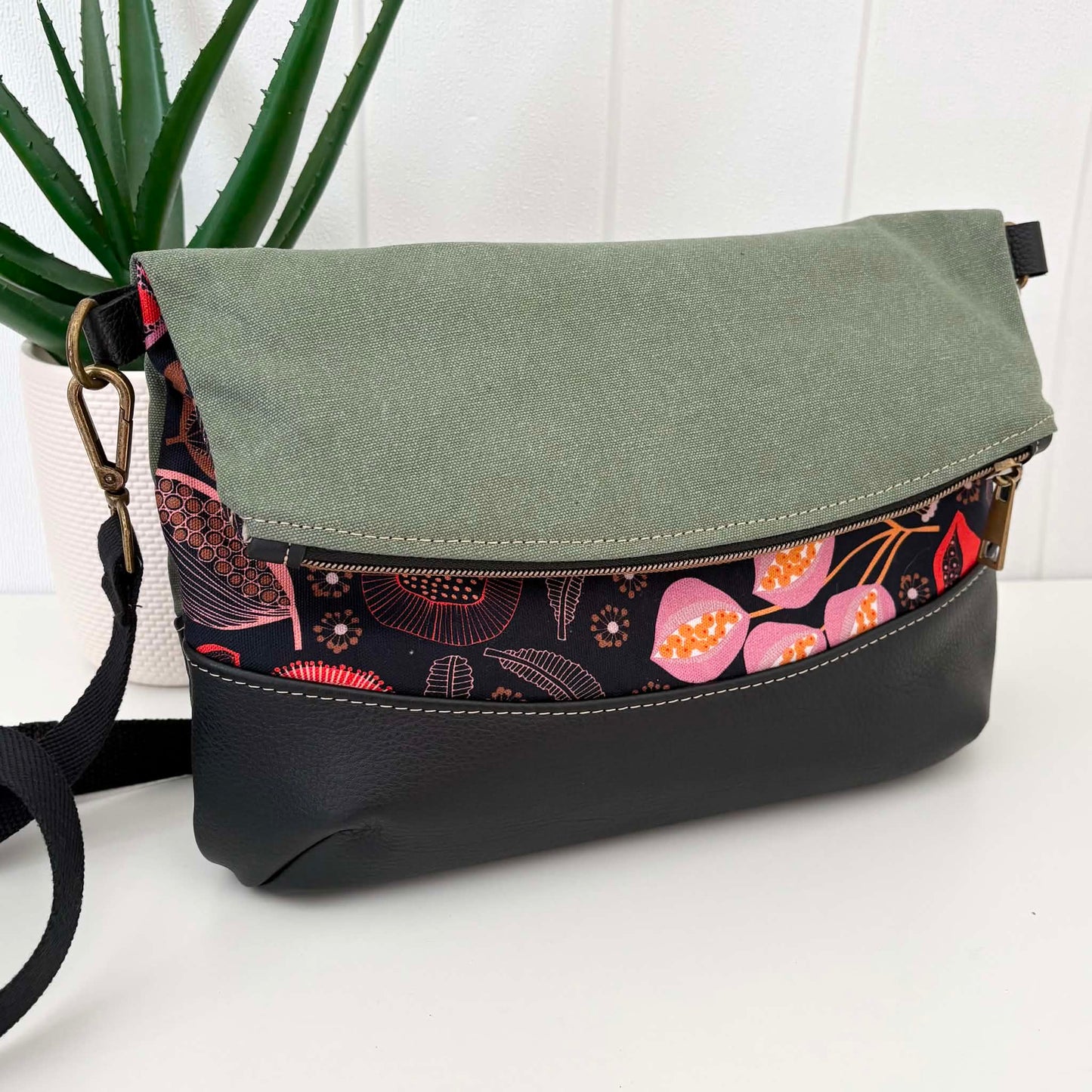 Hovea Fold Over Bag in Tan Leather, Green Canvas and Seed Pod